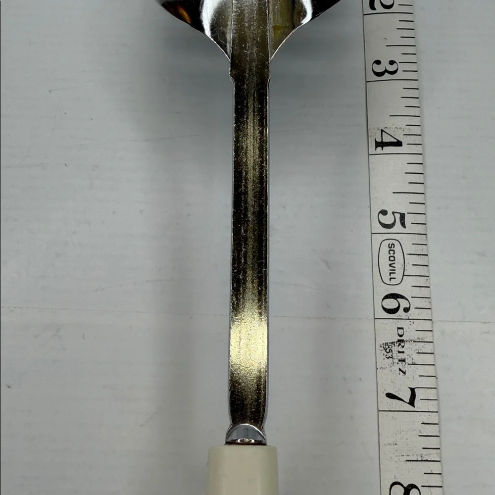 Vintage EKCO Chromium Plated Slotted Spoon with Cream Handle
